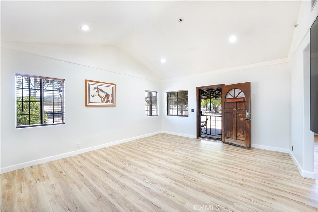 2165 Lilac Road Ramona, CA 92065 - Photo 8 of 49 a view of empty room with wooden floor
