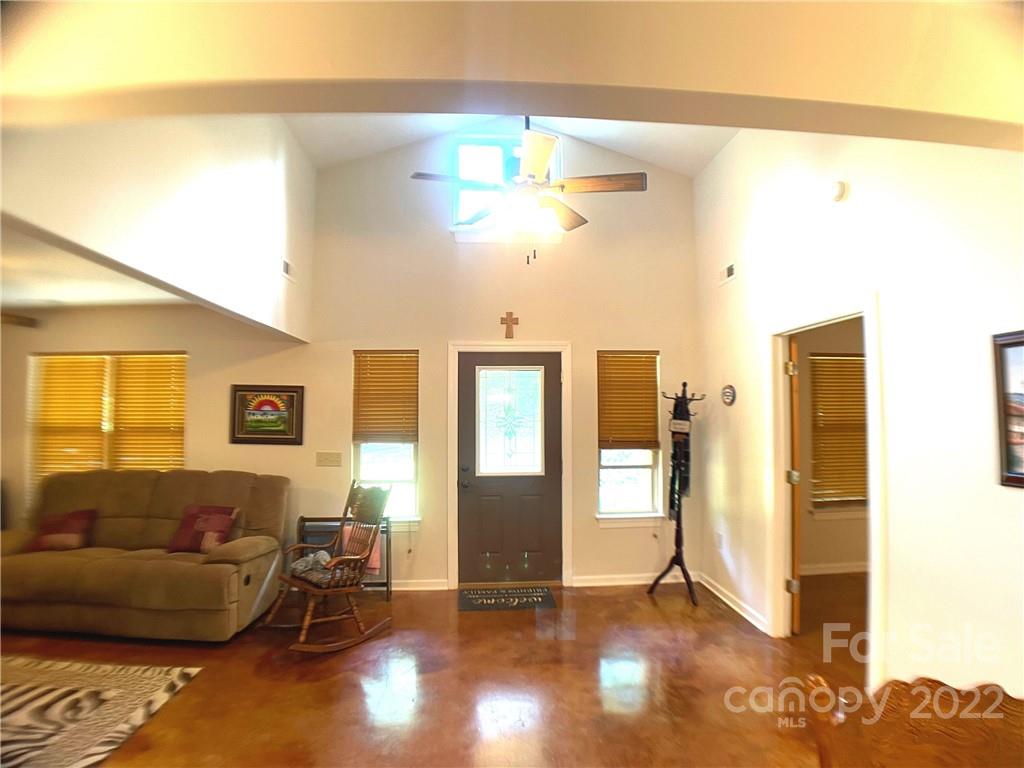 369 Pinecrest Circle Troy, NC 27371 - Photo 2 of 6 a living room with furniture and a window
