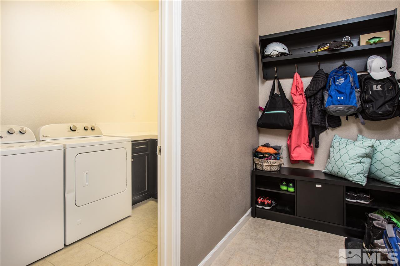 3045 Show Jumper Lane Reno, NV 89521 - Photo 14 of 22 a utility room with dryer and washer