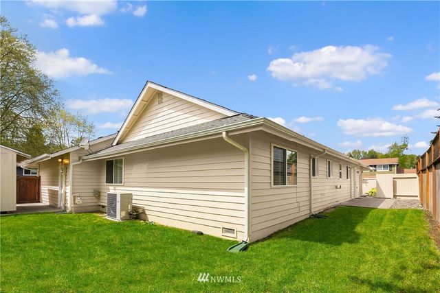 a view of a back yard of the house