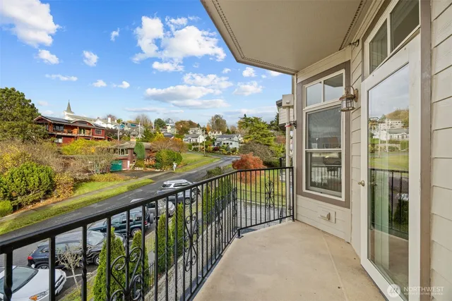 a view of a balcony with city view