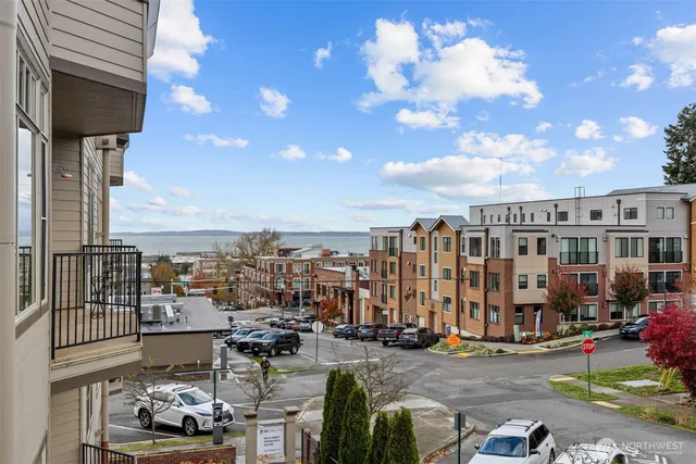 a view of a brick building with many windows