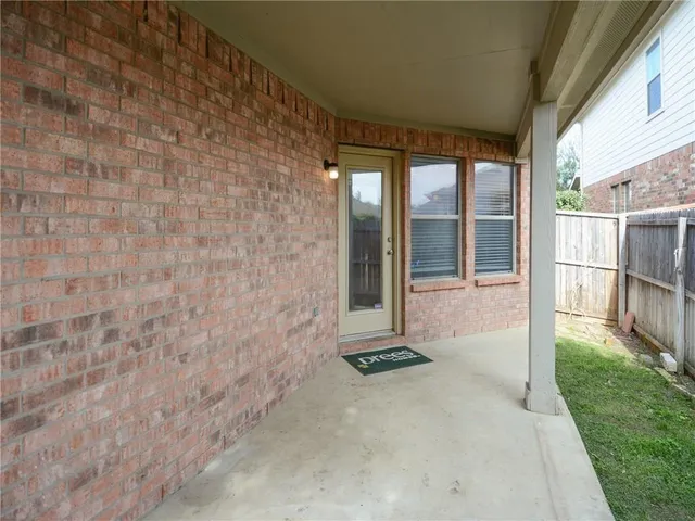 a view of outdoor space with backyard and porch