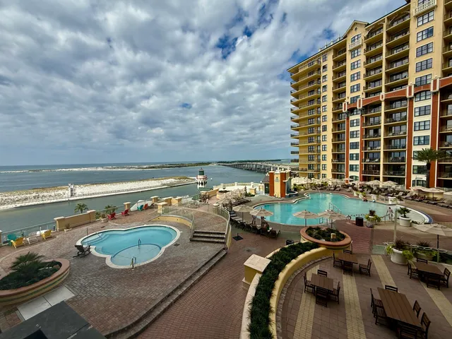 a view of swimming pool with outdoor seating