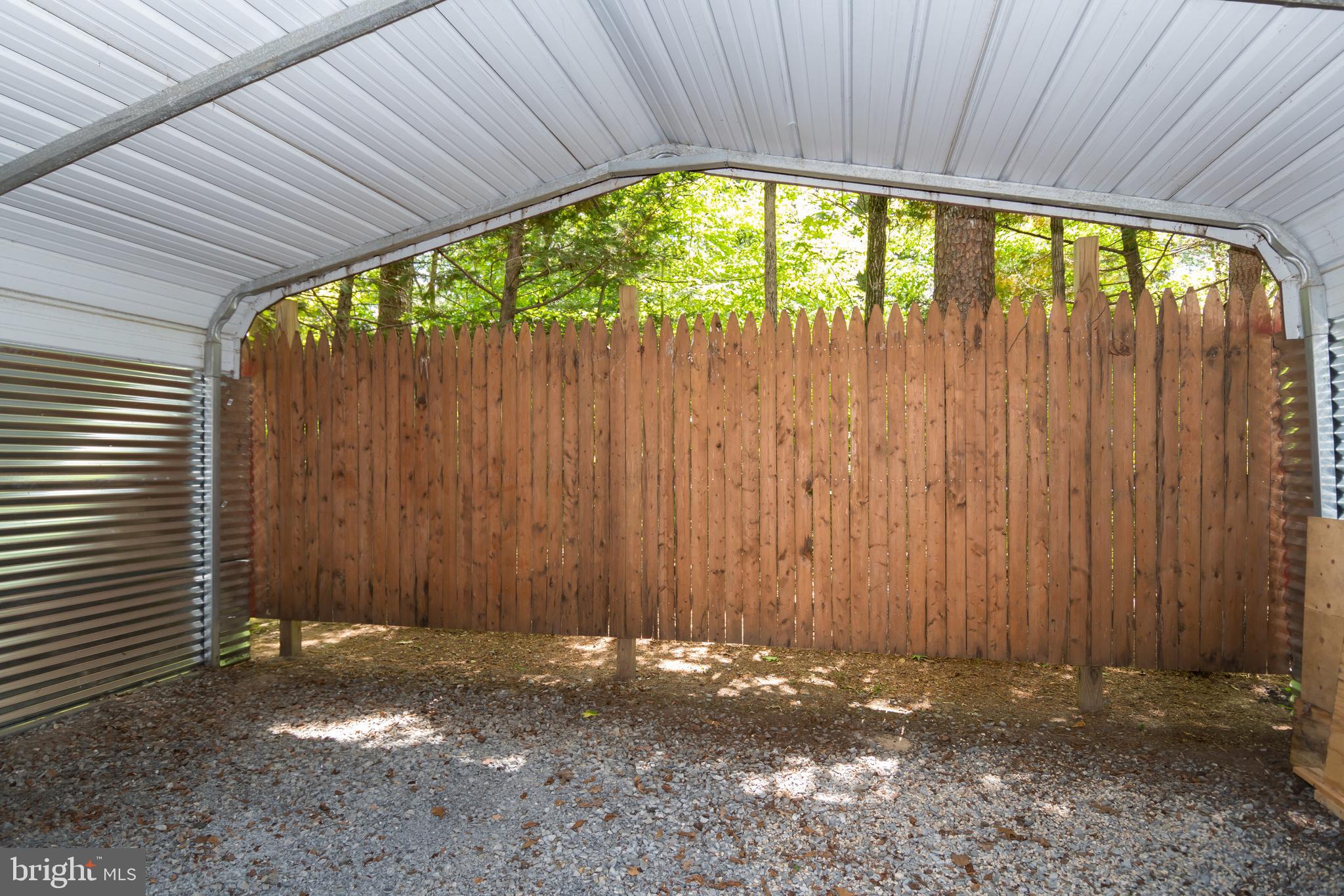14700 Plains Court Ridgely, MD 21660 - Photo 32 of 53 Rear carport storage area