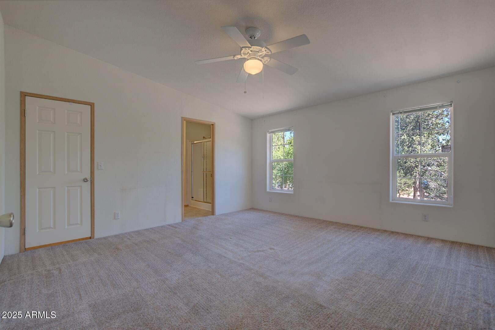 405 East Cherry Street Payson, AZ 85541 - Photo 23 of 47 a view of an empty room with a window