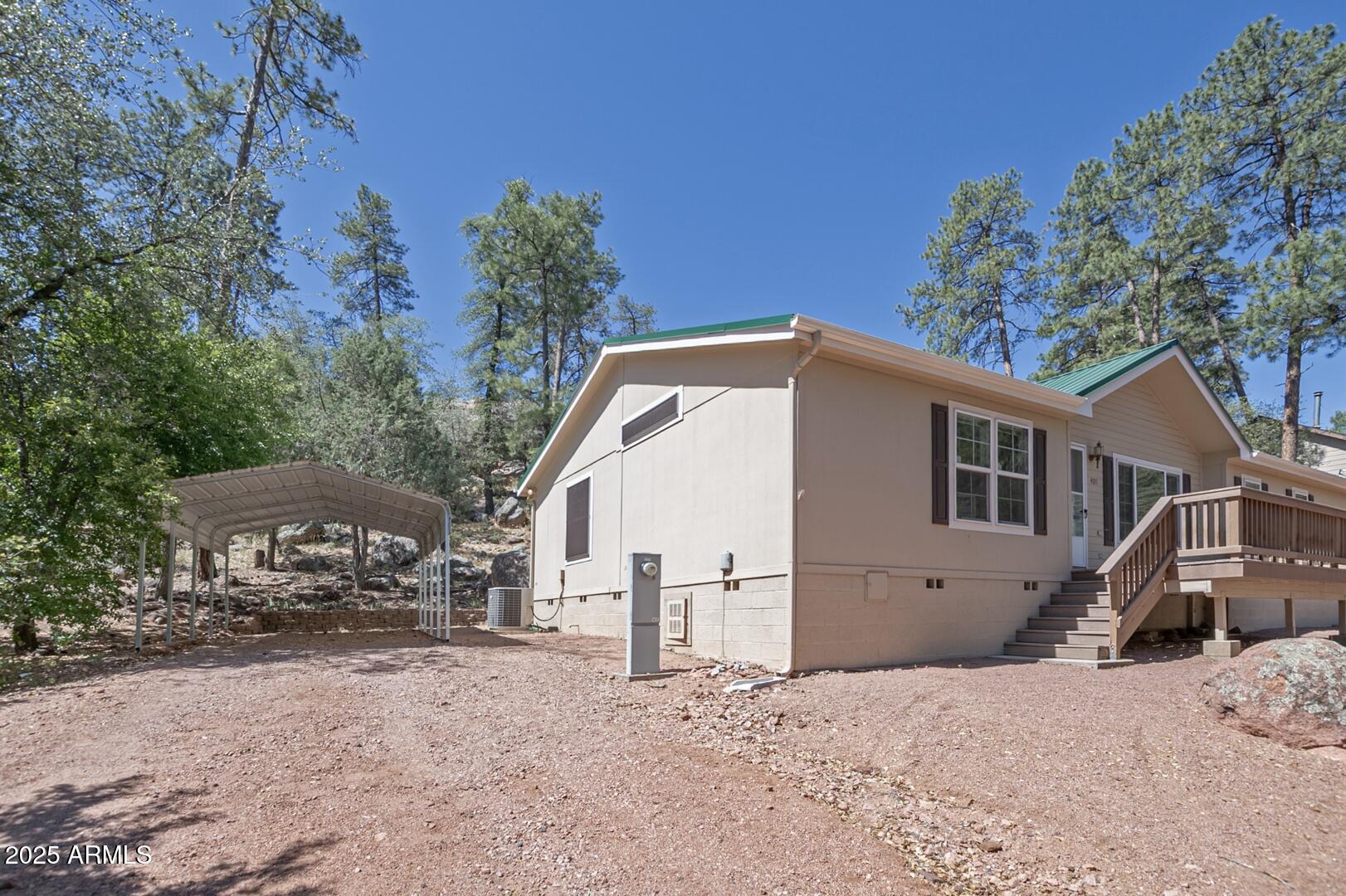 405 East Cherry Street Payson, AZ 85541 - Photo 3 of 47 a view of a house with a snow in the background