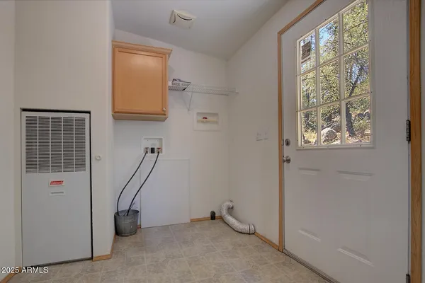 an aerial view of a city and mountains