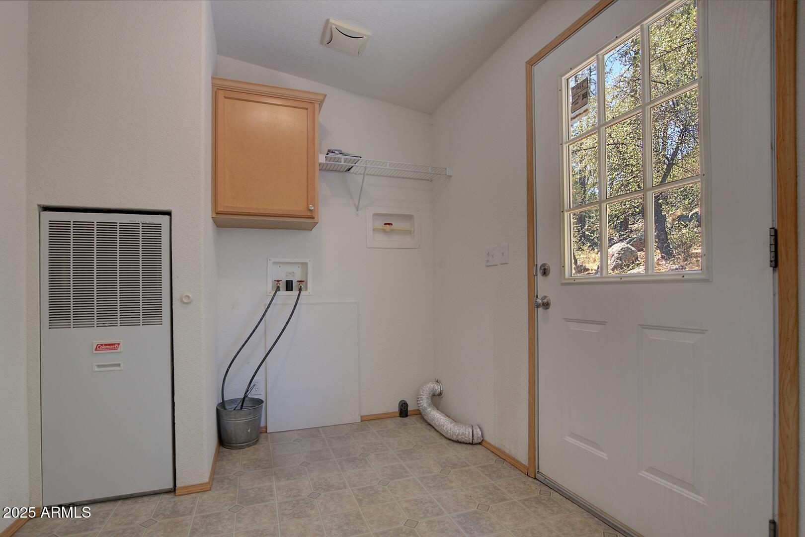 405 East Cherry Street Payson, AZ 85541 - Photo 36 of 47 a view of an entryway with wooden floor