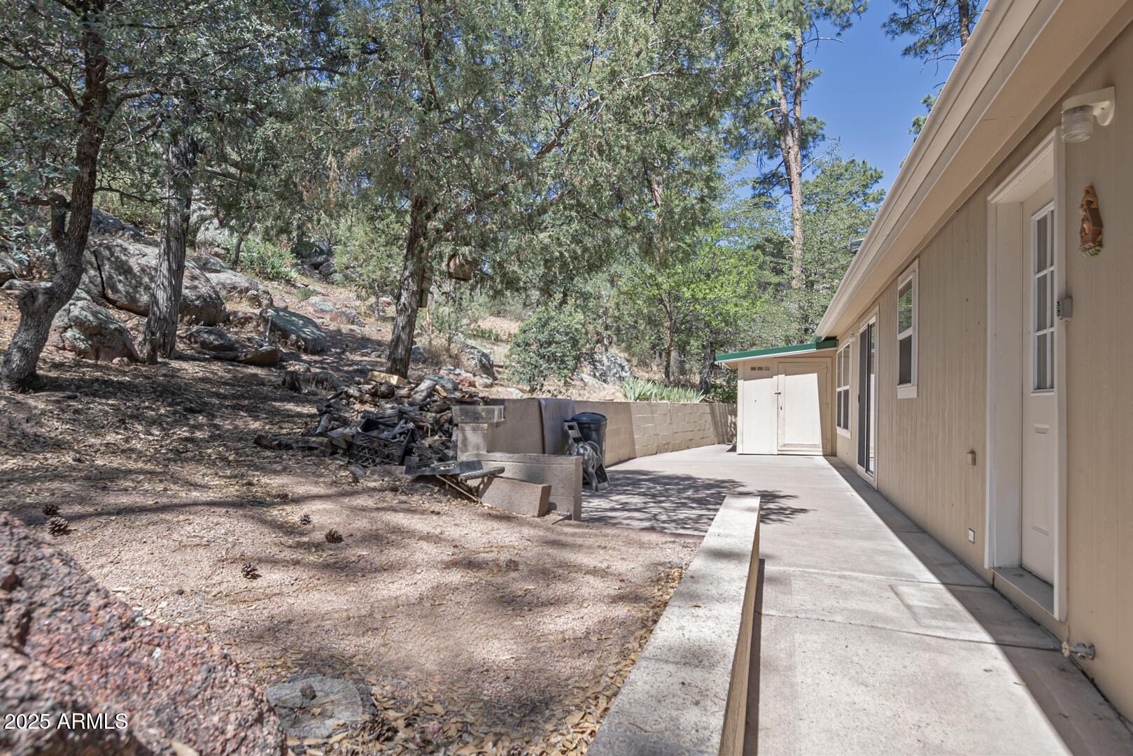 405 East Cherry Street Payson, AZ 85541 - Photo 42 of 47 a view of a house with backyard and sitting area
