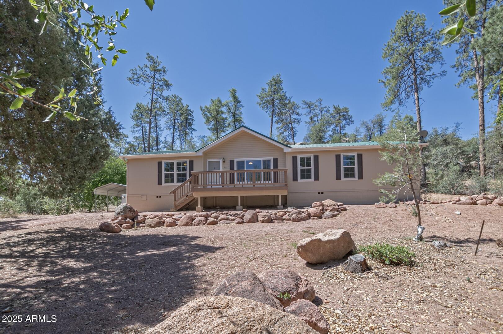 405 East Cherry Street Payson, AZ 85541 - Photo 5 of 47 a front view of a house with a yard