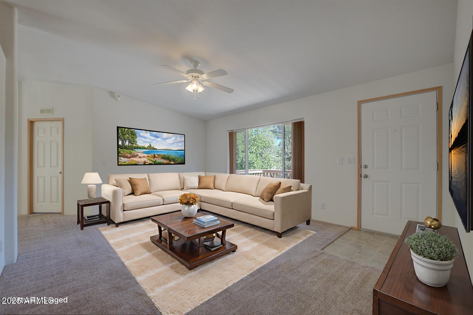 405 East Cherry Street Payson, AZ 85541 - Photo 10 of 47 a living room with furniture and a flat screen tv