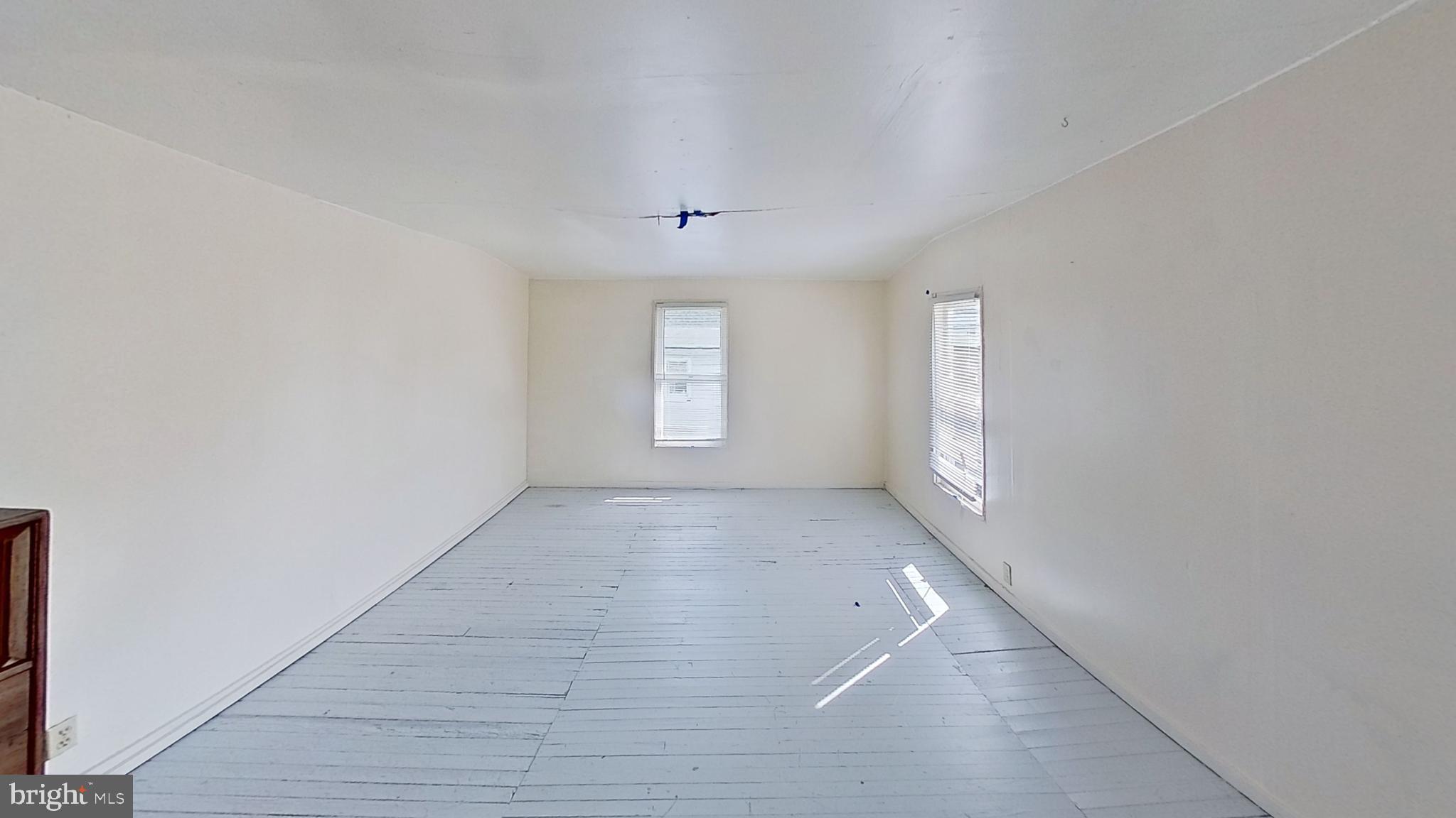 142 West Main Street, Unit C Windsor, PA 17366 - Photo 8 of 8 an empty room with windows