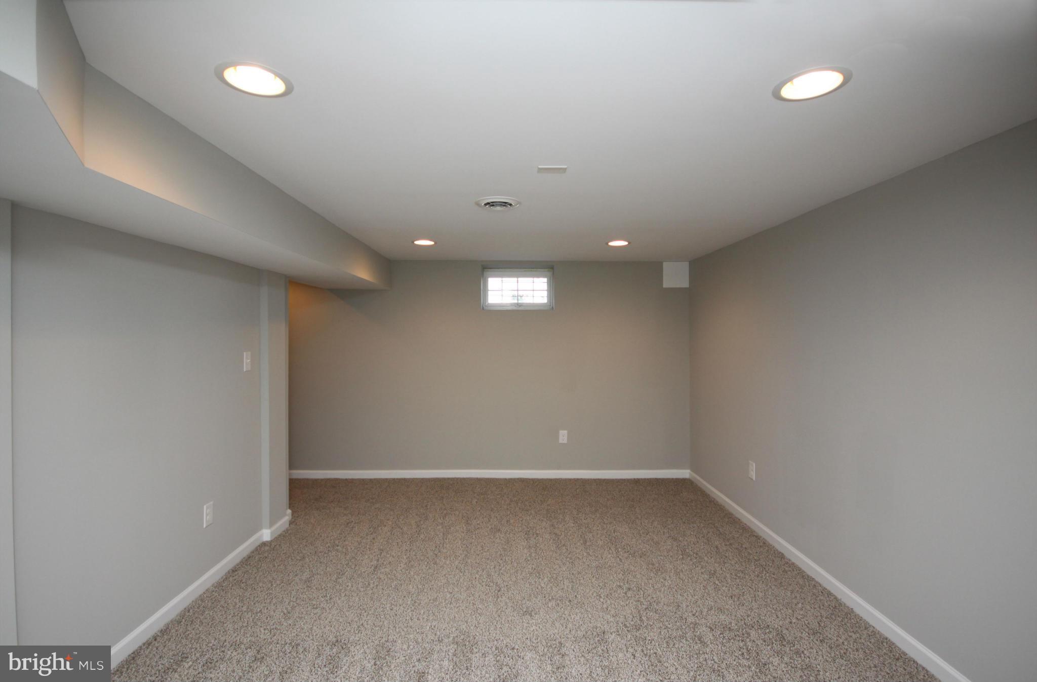 7103 Bexhill Road Baltimore, MD 21244 - Photo 21 of 30 an empty room with a empty space and window