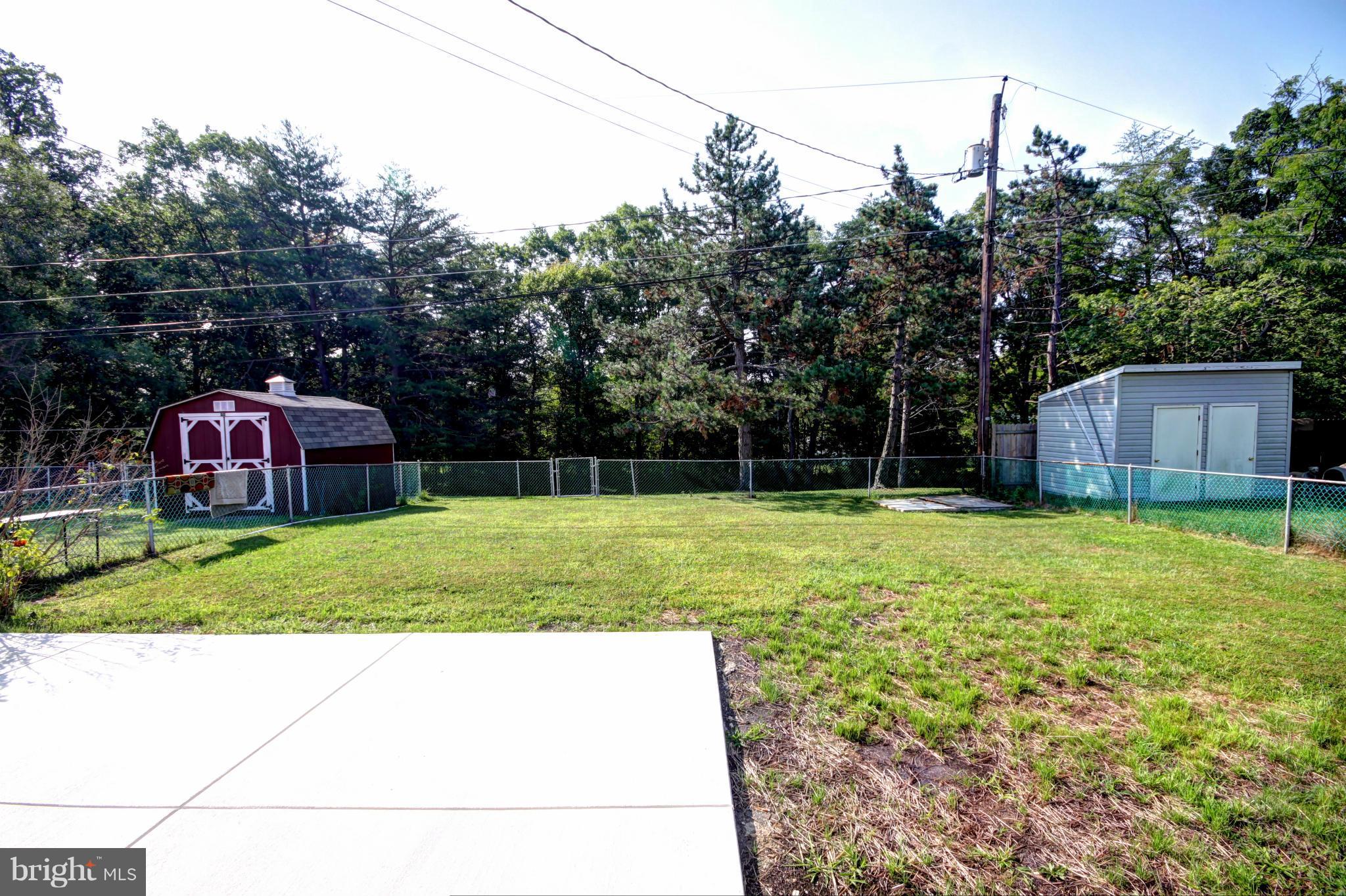 7103 Bexhill Road Baltimore, MD 21244 - Photo 25 of 30 a view of backyard with green space