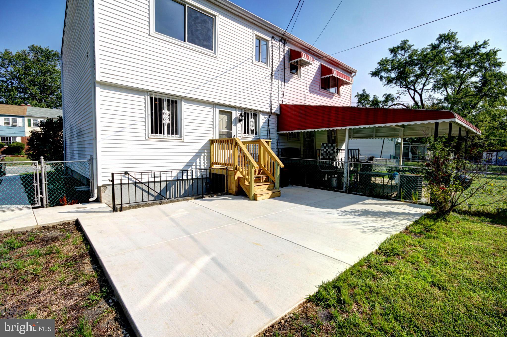 7103 Bexhill Road Baltimore, MD 21244 - Photo 27 of 30 a view of a house with barbeque and sitting area