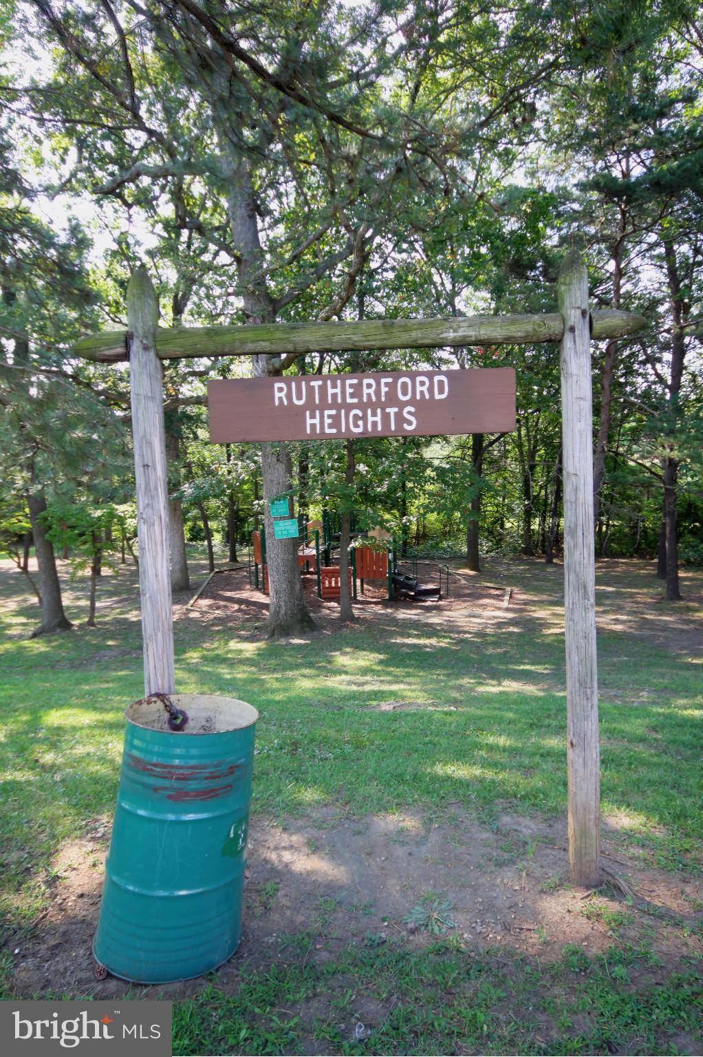 7103 Bexhill Road Baltimore, MD 21244 - Photo 28 of 30 a view of a park with a tree