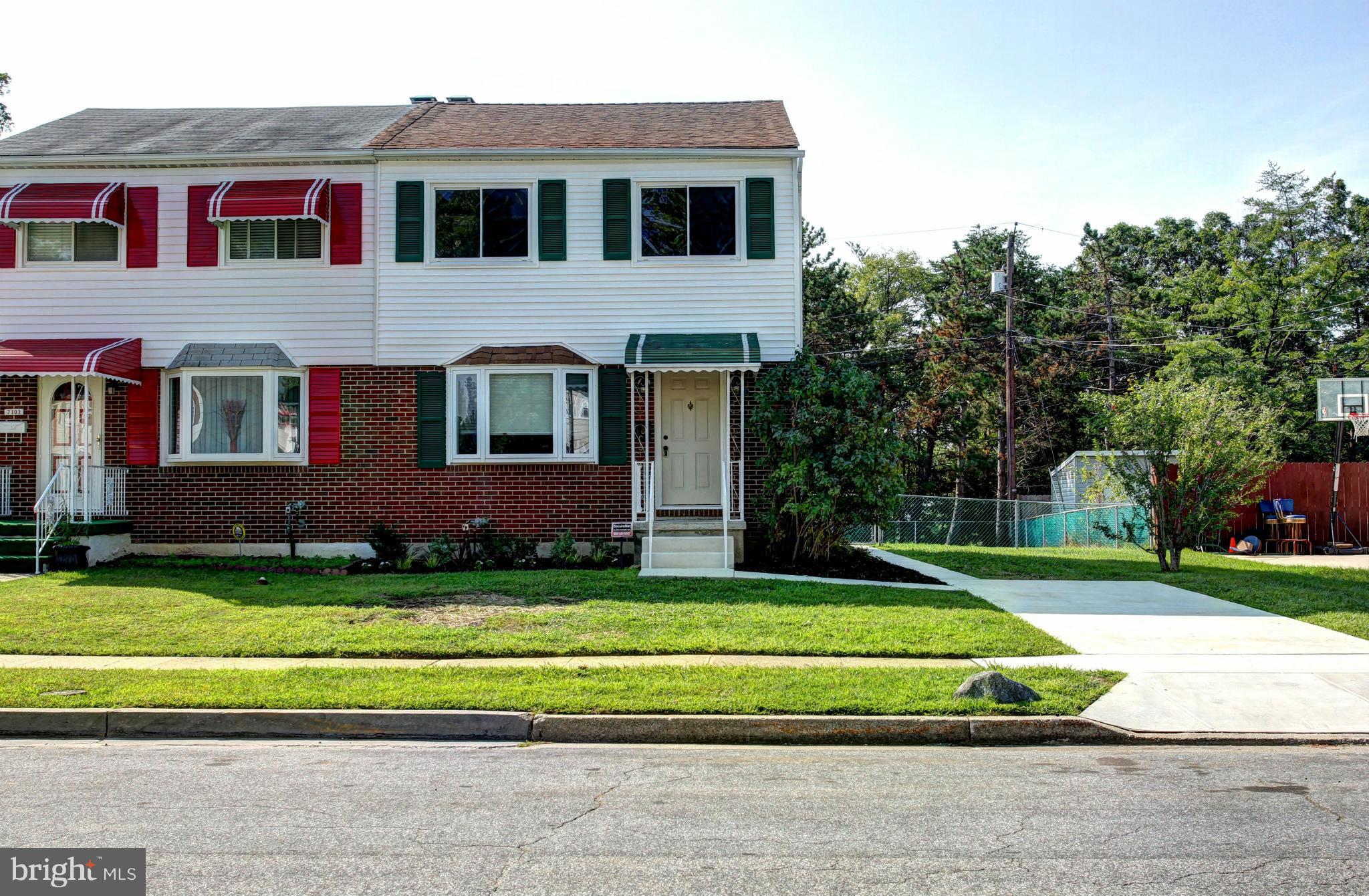 7103 Bexhill Road Baltimore, MD 21244 - Photo 30 of 30 a front view of a house with a yard