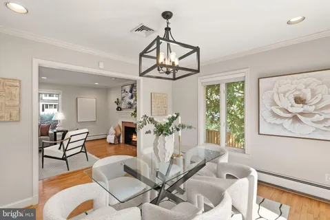 a kitchen with granite countertop a sink stove and refrigerator