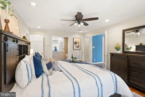 a bed room with a bed and a window