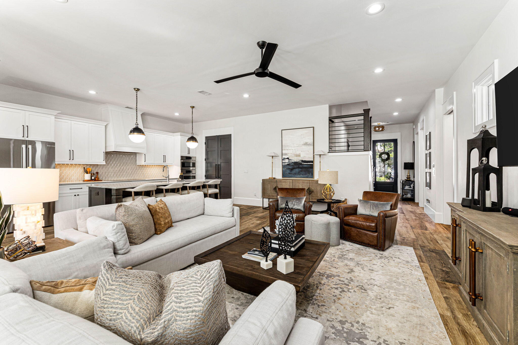 1980 Baytowne Loop Miramar Beach, FL 32550 - Photo 12 of 95 a living room with furniture kitchen view and a chandelier