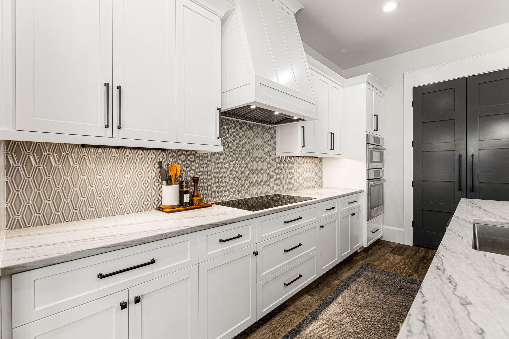1980 Baytowne Loop Miramar Beach, FL 32550 - Photo 16 of 95 a kitchen with granite countertop white cabinets and white appliances