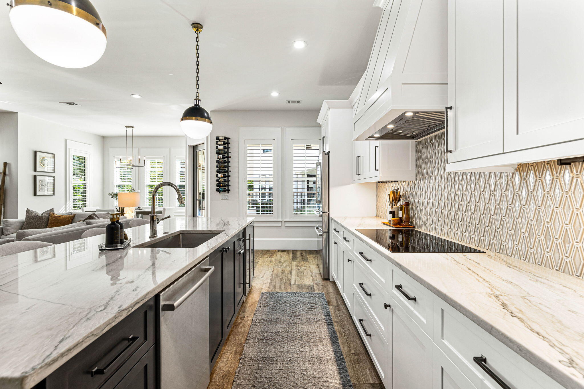 1980 Baytowne Loop Miramar Beach, FL 32550 - Photo 17 of 95 a large kitchen with granite countertop a sink and cabinets
