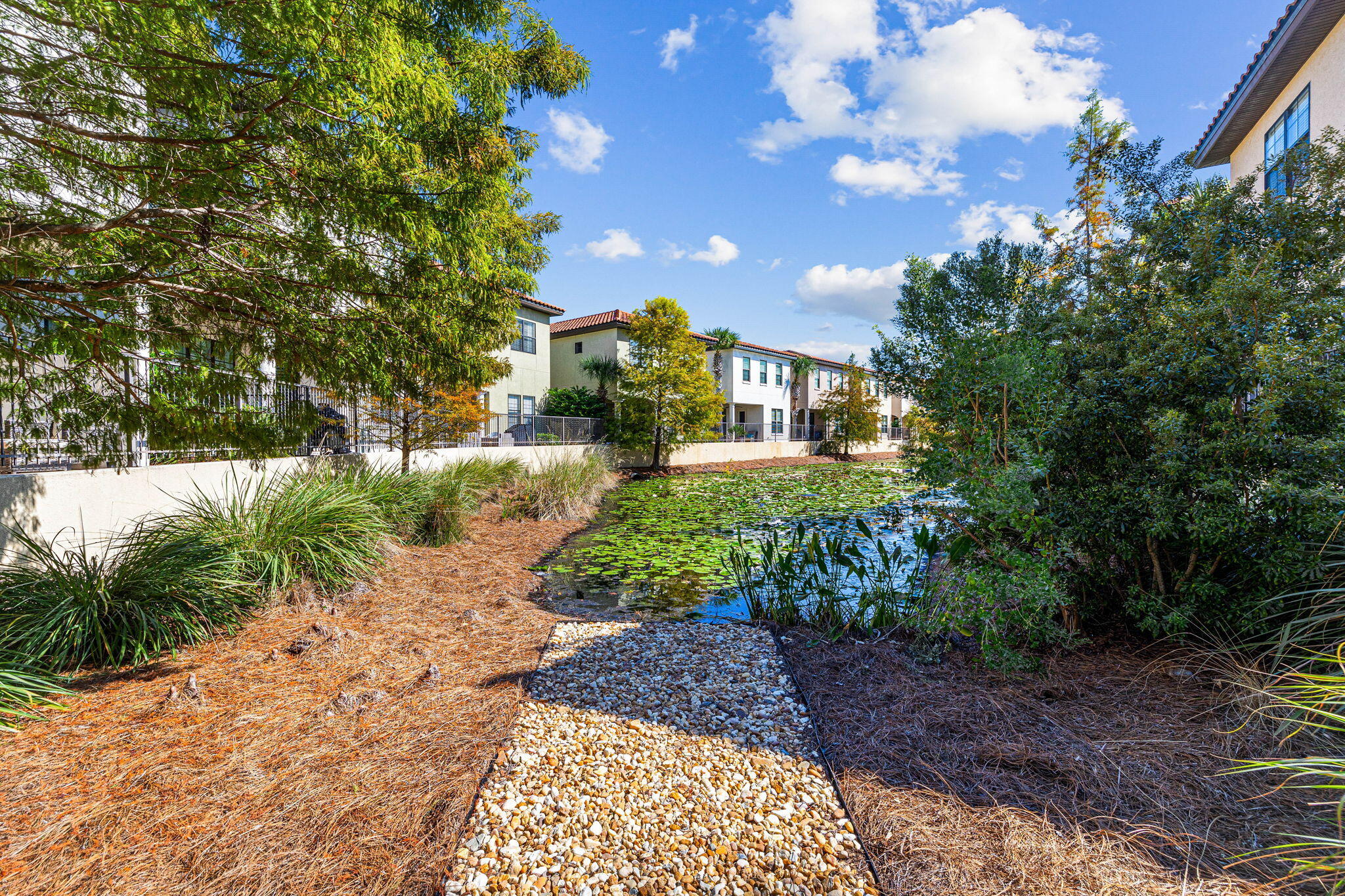 1980 Baytowne Loop Miramar Beach, FL 32550 - Photo 28 of 95 a front view of a house with a yard