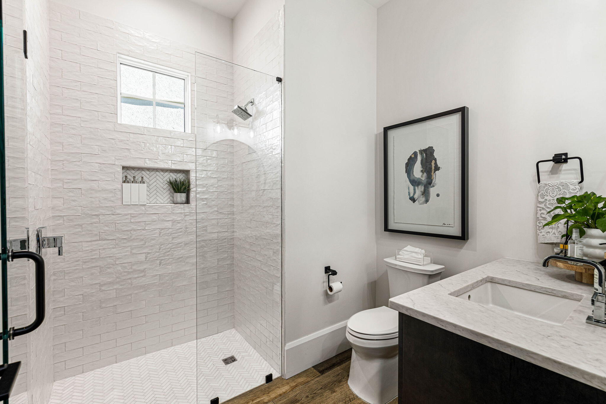 1980 Baytowne Loop Miramar Beach, FL 32550 - Photo 30 of 95 a bathroom with a sink a toilet and shower