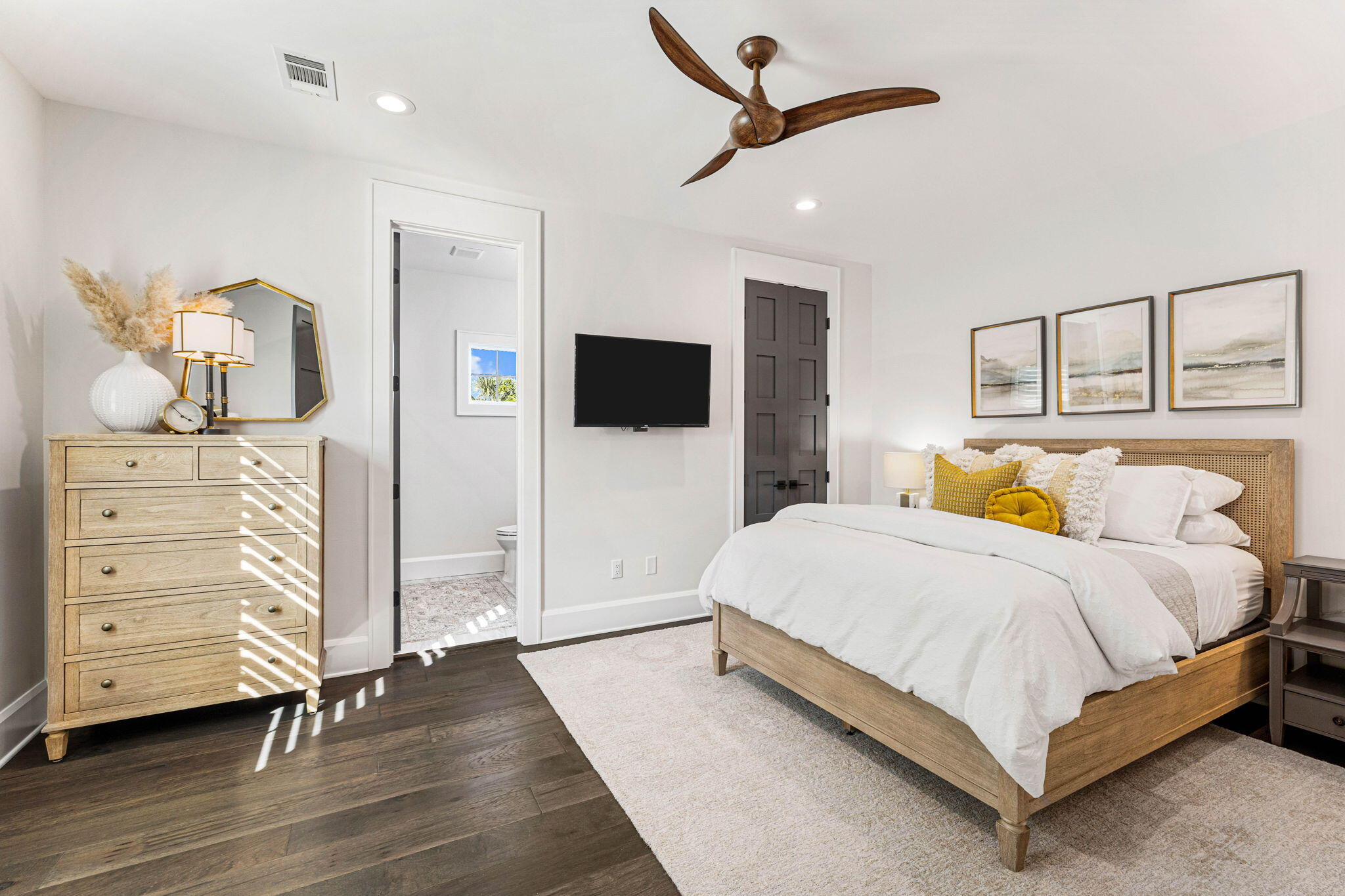 1980 Baytowne Loop Miramar Beach, FL 32550 - Photo 37 of 95 a spacious bedroom with a bed and a flat tv screen