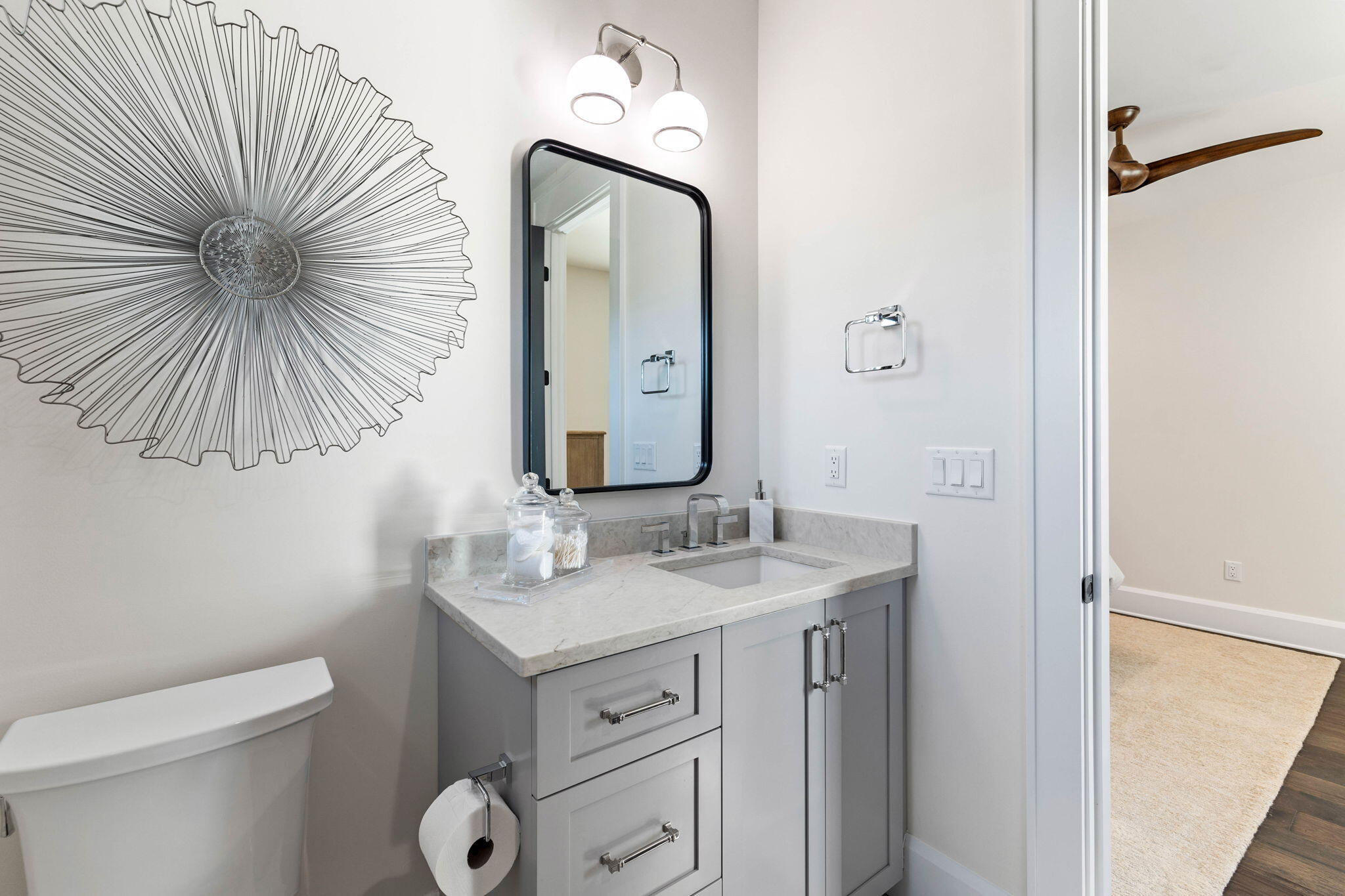 1980 Baytowne Loop Miramar Beach, FL 32550 - Photo 40 of 95 a bathroom with a toilet sink and mirror