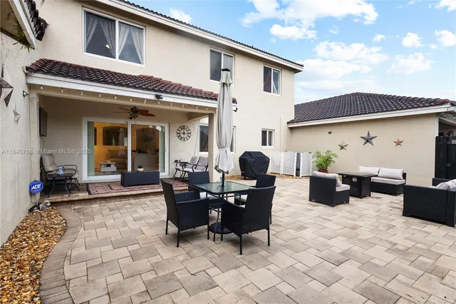 a view of balcony with furniture