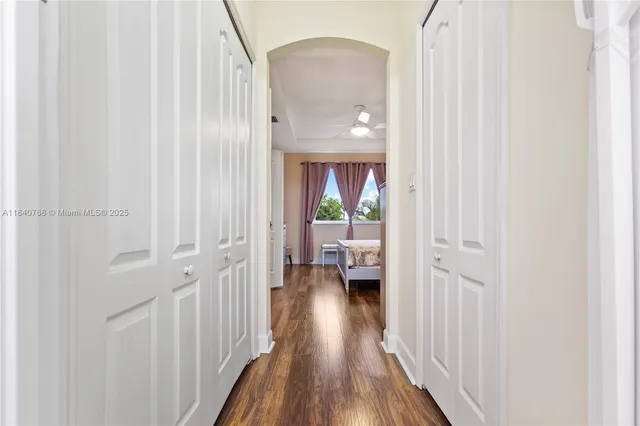a bathroom with a double vanity sink mirror double and shower