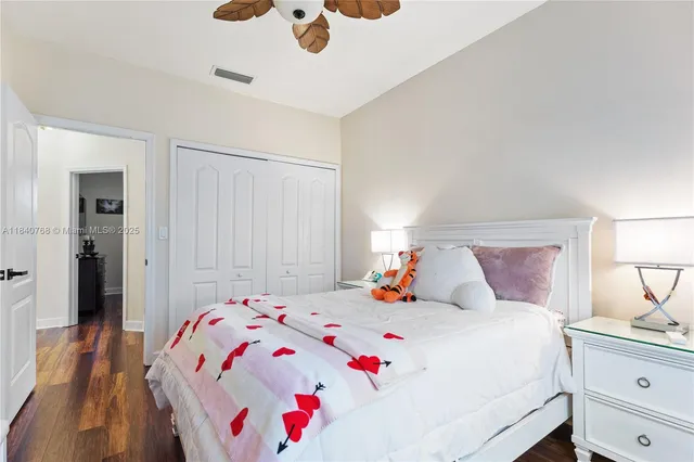 a view of parking garage with cars