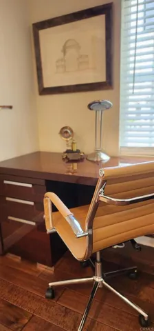 a room with table and mirror