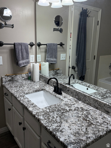 14797 South Chandlerpoint Way Draper, UT 84020 - Photo 17 of 33 Dual vanity with patterned countertop and integrated sinks