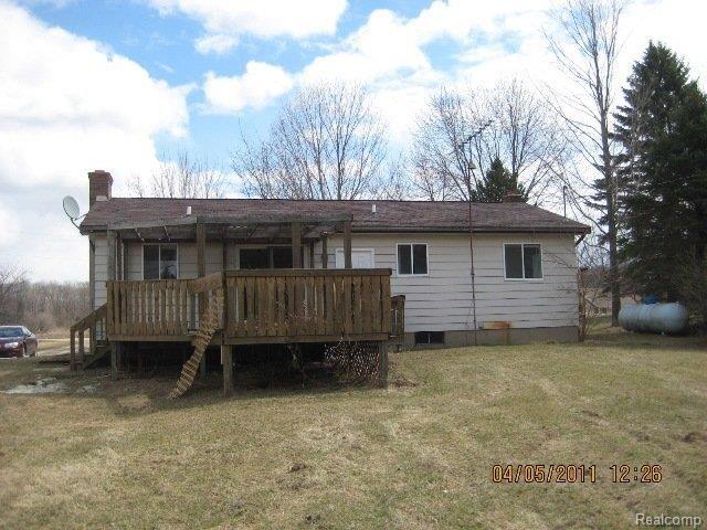 7102 Hinchey Road Pinckney, MI 48169 - Photo 2 of 14 rear
