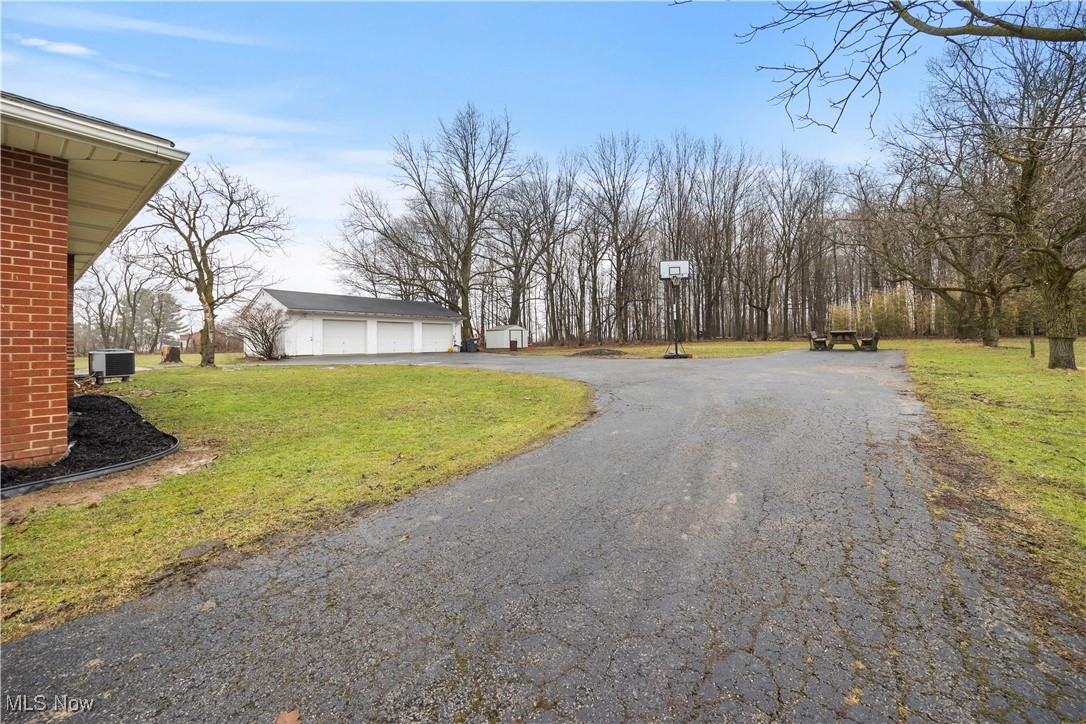 14312 Butler Road Wakeman, OH 44889 - Photo 35 of 42 driveway halfway up to house