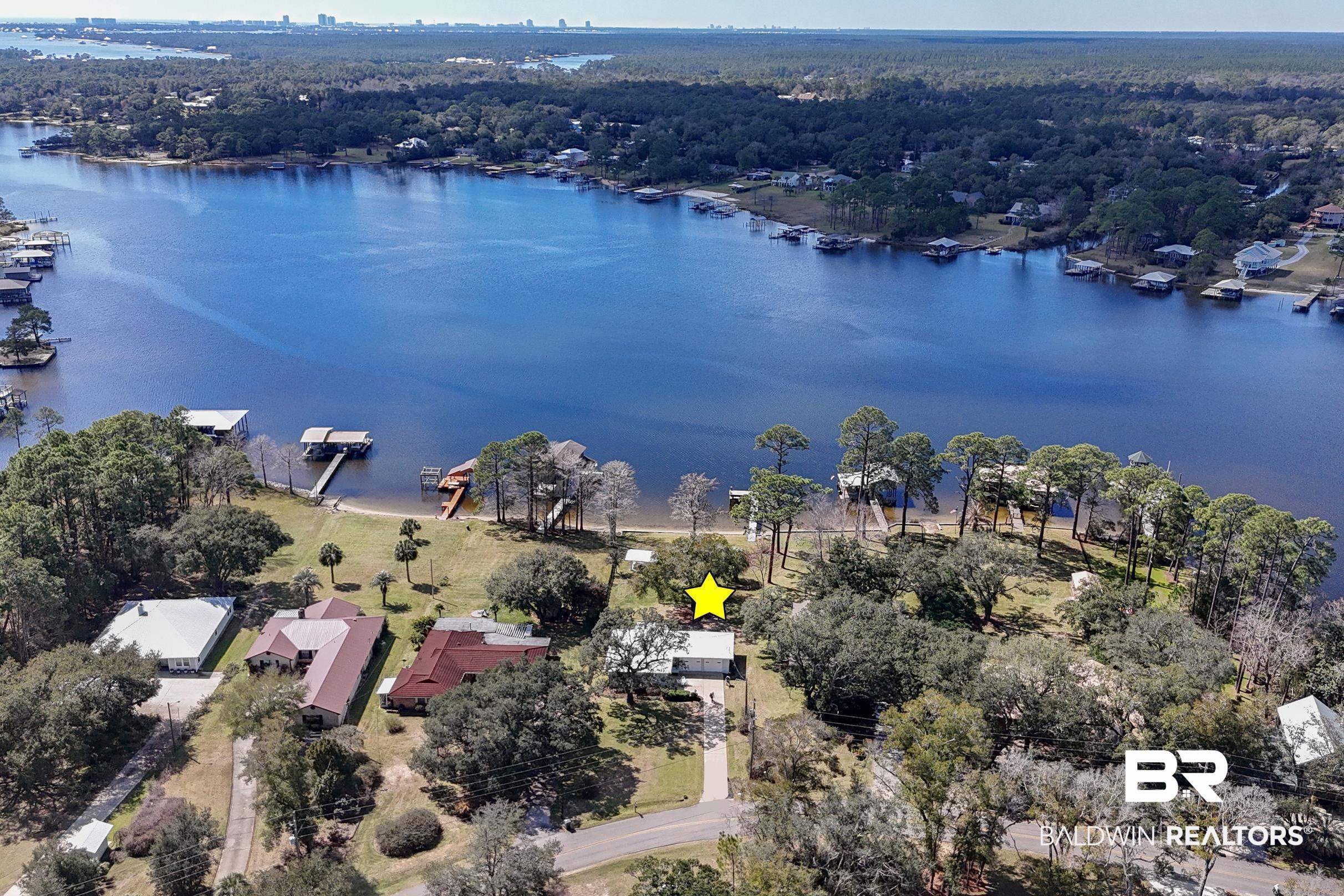 9459 Soldier Creek Road Lillian, AL 36549 - Photo 47 of 54 Aerial view with a forest view and a water view