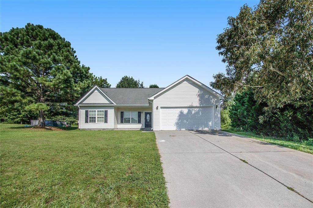 74 Millstream Drive Dallas, GA 30157 - Photo 1 of 1 front view of house with a yard