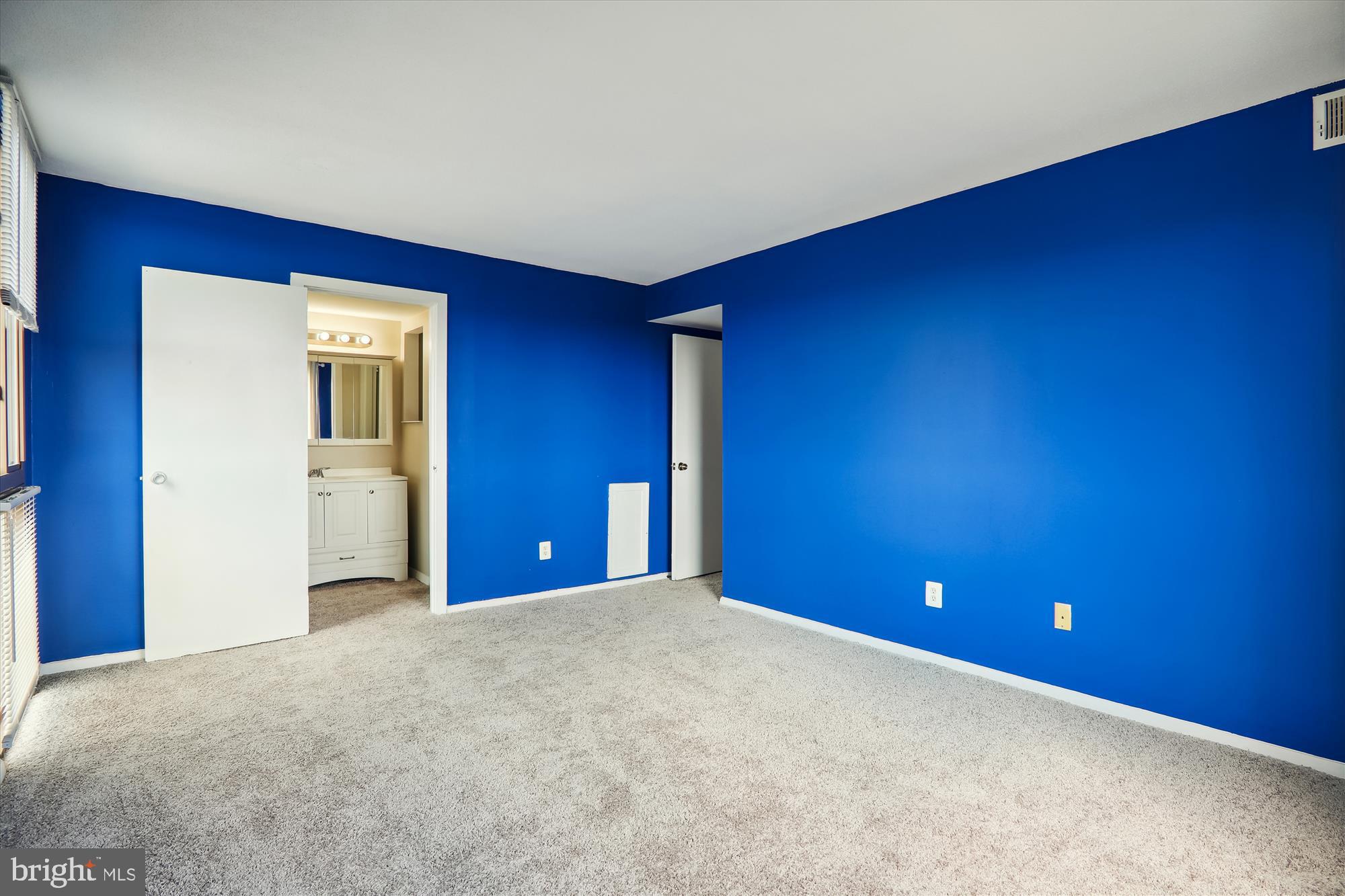 1836 Metzerott Road, Unit 923 Hyattsville, MD 20783 - Photo 16 of 25 Primary Bedroom with View of Primary Bathroom