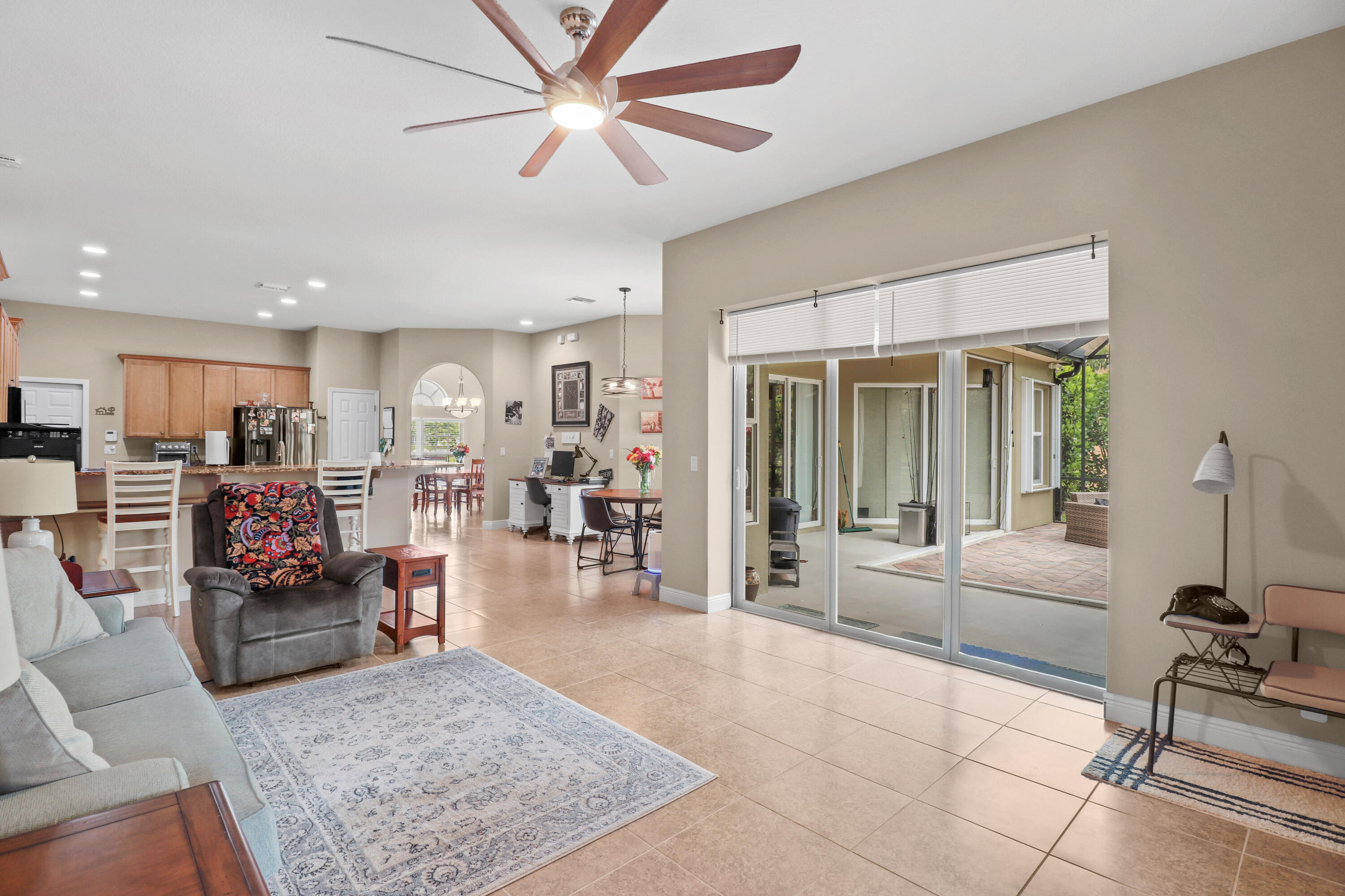2242 Southwest Panther Trace Stuart, FL 34997 - Photo 27 of 63 a living room with furniture and a rug