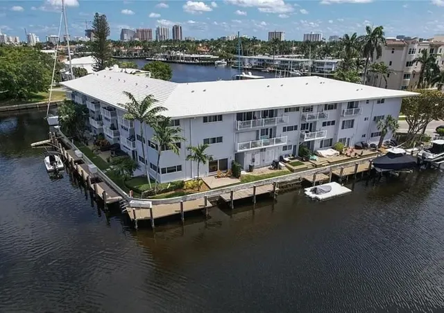 a terrace with outdoor seating and city view