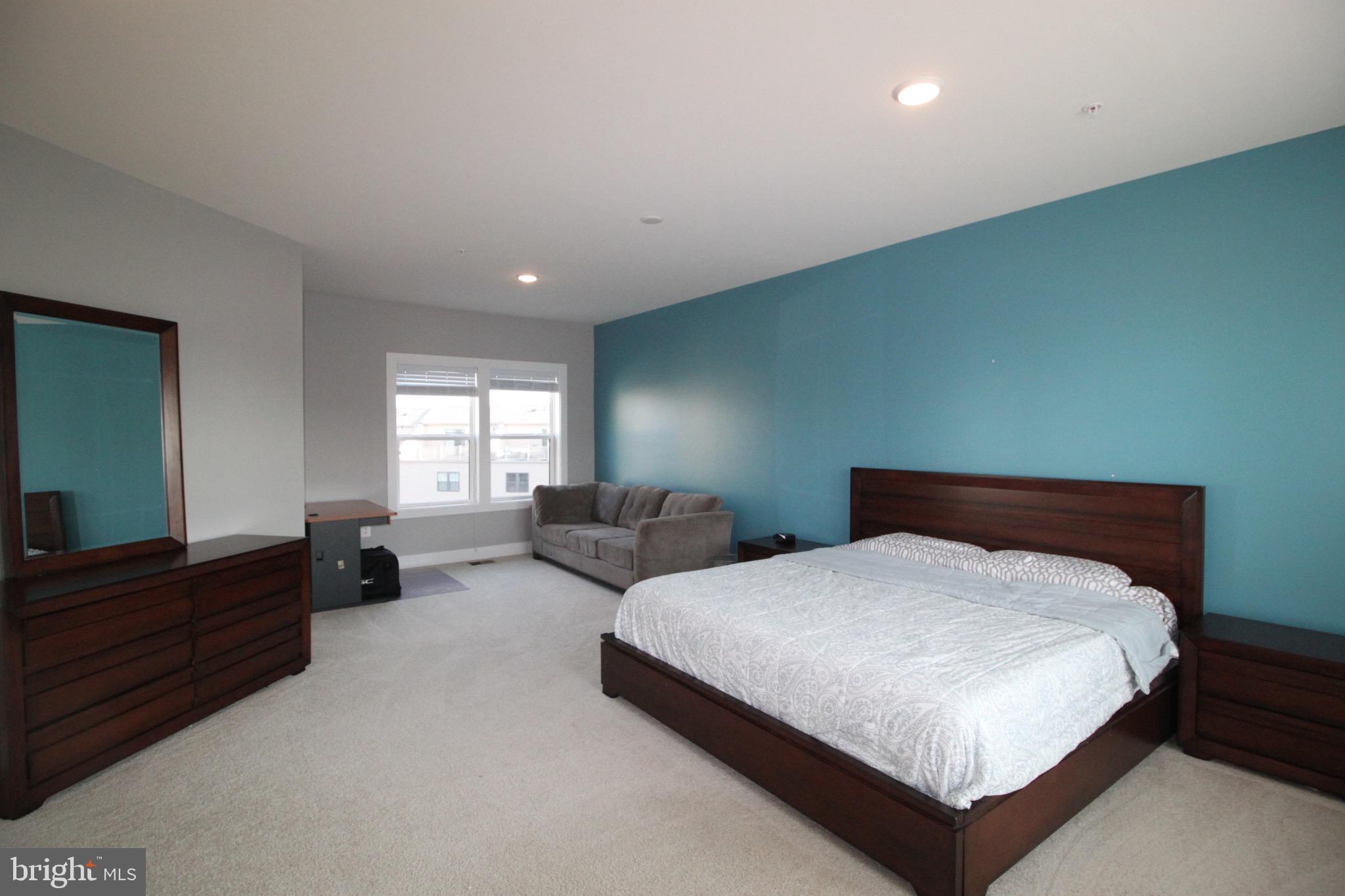 44738 Tiverton Square Ashburn, VA 20147 - Photo 39 of 66 a bedroom with two beds and a window