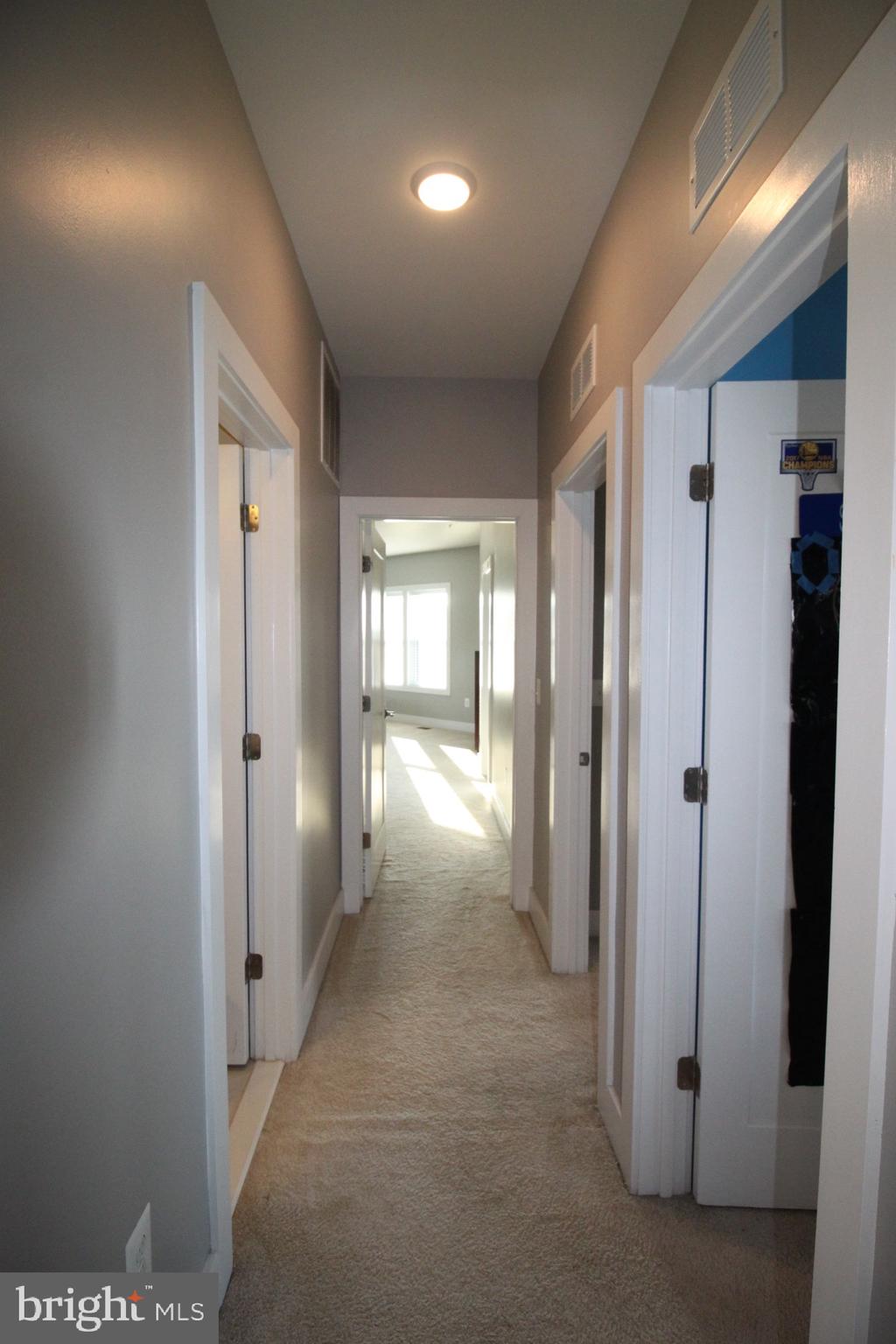 44738 Tiverton Square Ashburn, VA 20147 - Photo 54 of 66 a view of hallway with livingroom