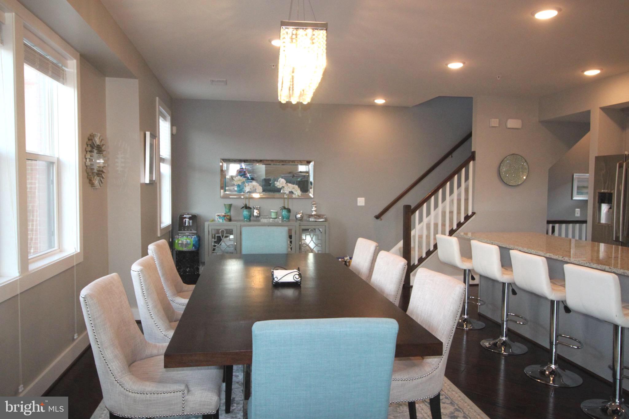 44738 Tiverton Square Ashburn, VA 20147 - Photo 8 of 66 a view of a dining room with furniture