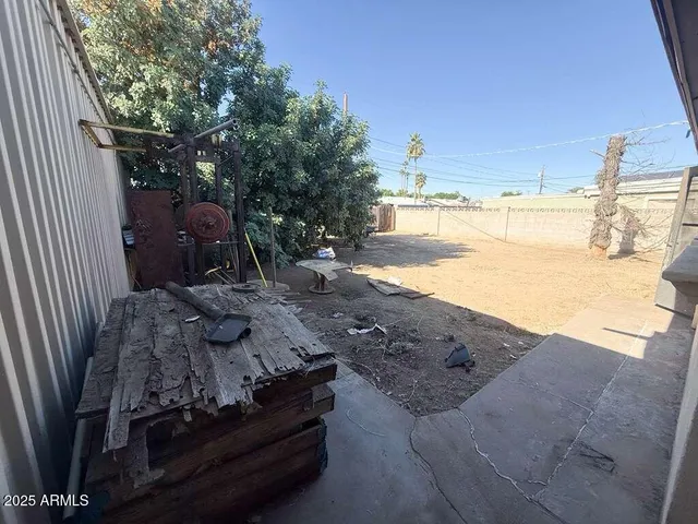 a view of a road with a building in the background