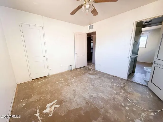 a view of a backyard with sitting area