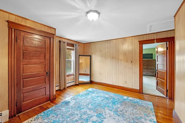 an empty room with closet area