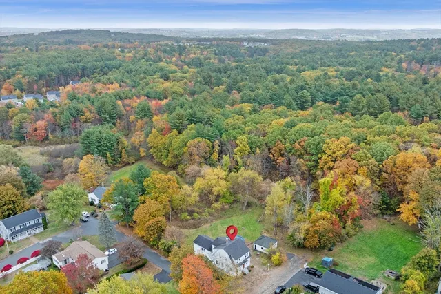 an aerial view of a city with lots of residential buildings